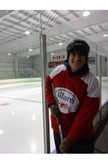 José Ramirez-Rivera, SIS/BA '14, in hockey gear in Canada.